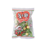 飴屋六兵衛本舗 りんご飴のパッケージ。りんご籠を背負い白い頭巾をかぶった女性のイラストが描かれており、北国の味、りんご飴と書かれています。