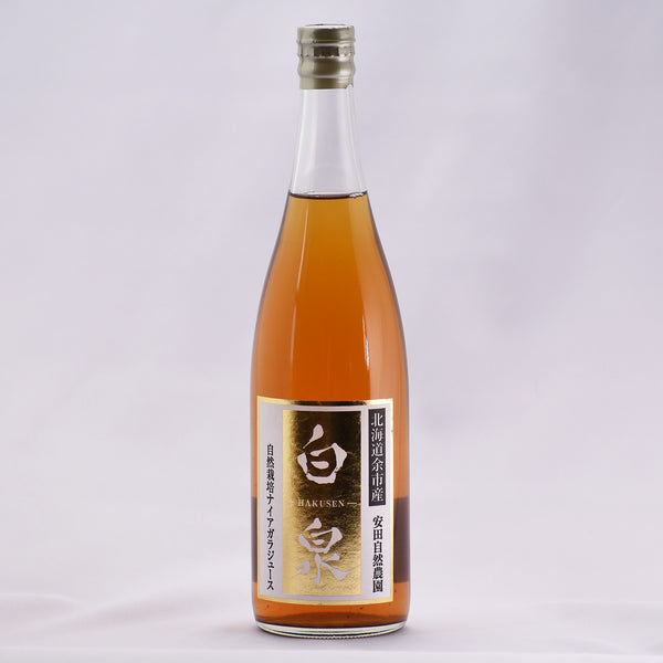 安田自然農園　ぶどうジュース  白泉  710ml　ボトル正面の写真。北海道余市産、自然栽培ナイアガラジュースと描かれています。